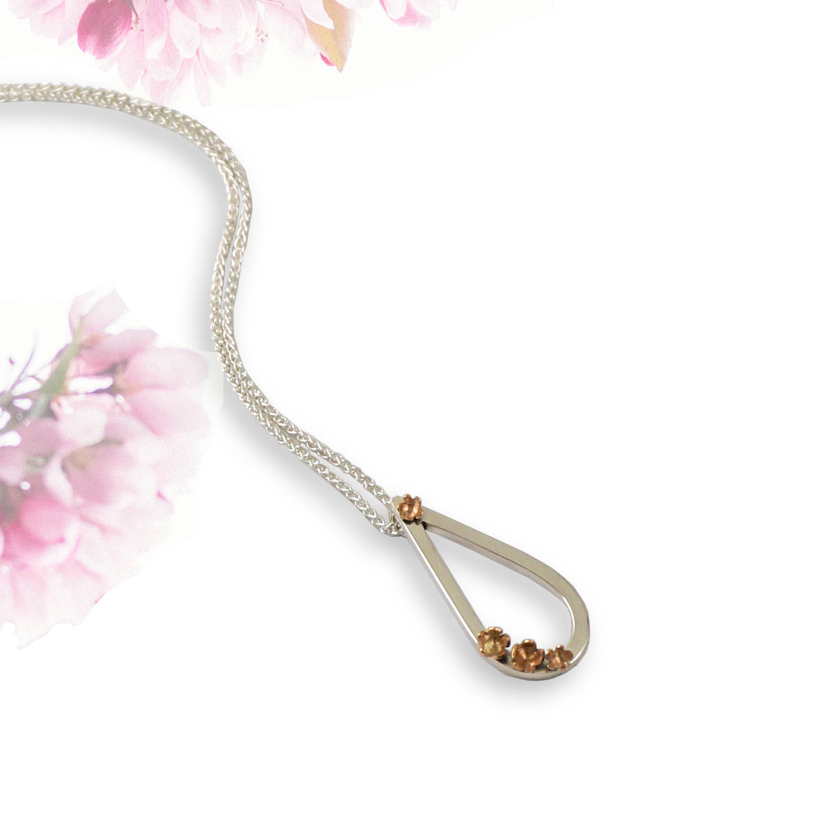 Cherry Blossom Flower Teardrop Rose Gold Pendant, Sterling Silver Sakura necklace, Minimalist Jewellery, handcrafted to a high standard. Park Road Jewellery Rose Gold Blossom silver flower Pendant park Road Jewellery Sterling Silver Flower pendant