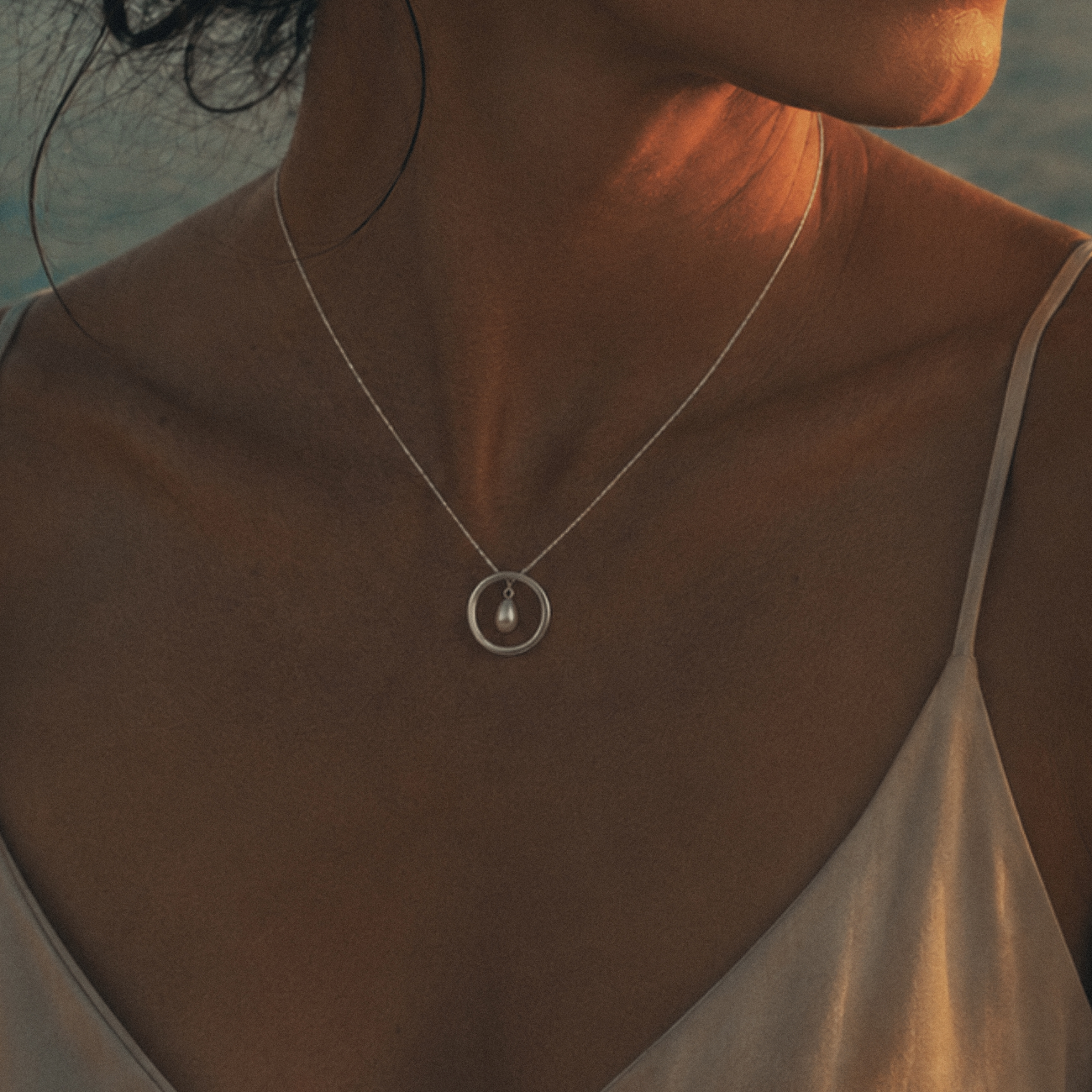 Modern Pearl Twisted Silver Circle Pendant. June birthstone pendant gift. Park Road Jewellery