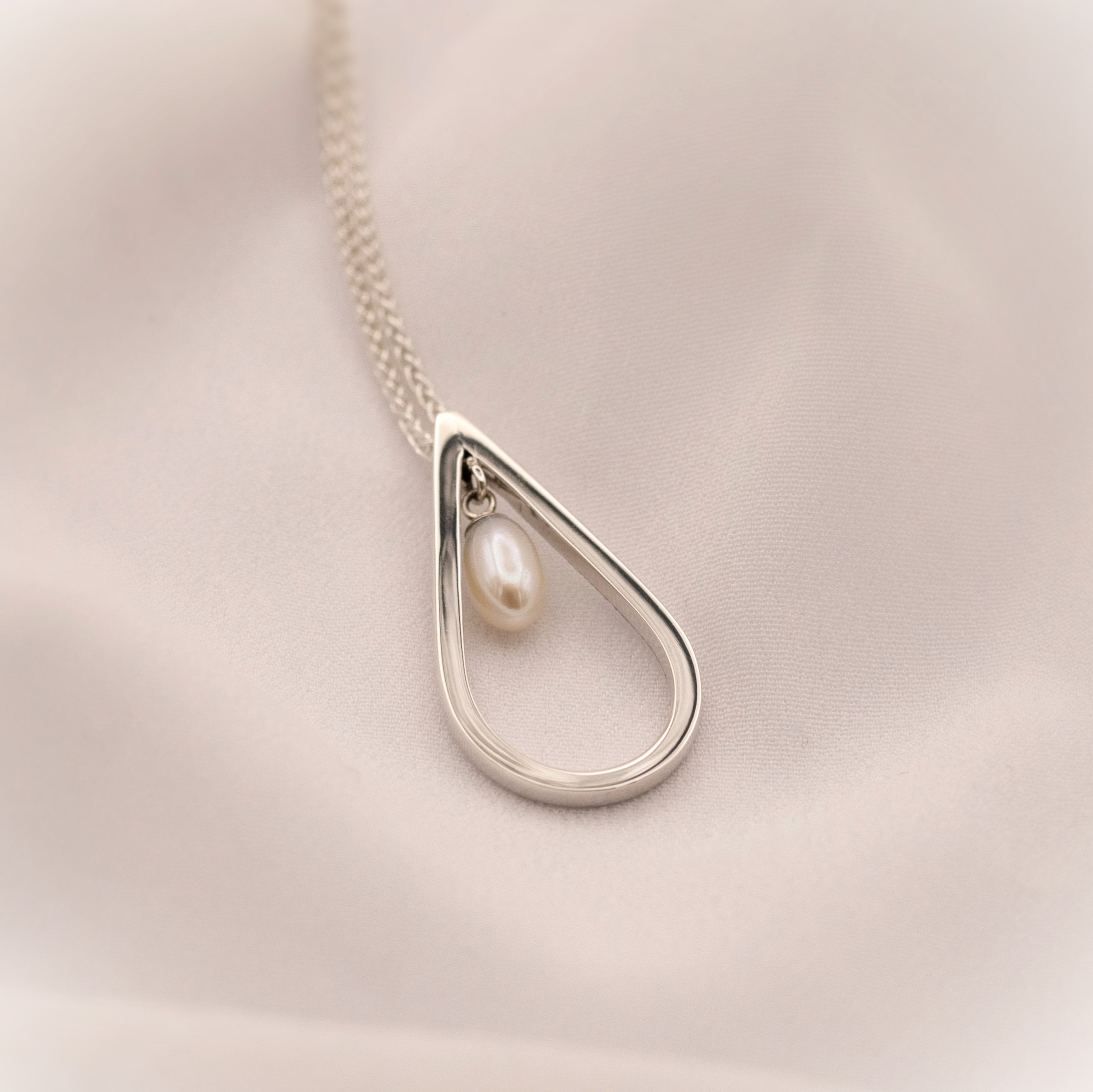 Modern Pearl Silver Teardrop Pendant, June birthstone jewellery, modern bridal jewellery. park Road Jewellery